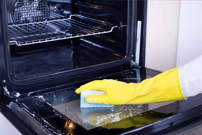 Professional oven cleaning, grease removal from oven racks and glass door, Zim Property Care